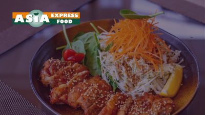 Warehouse worker at Asia Express Food using a Neptune digital goods receipt app on a tablet